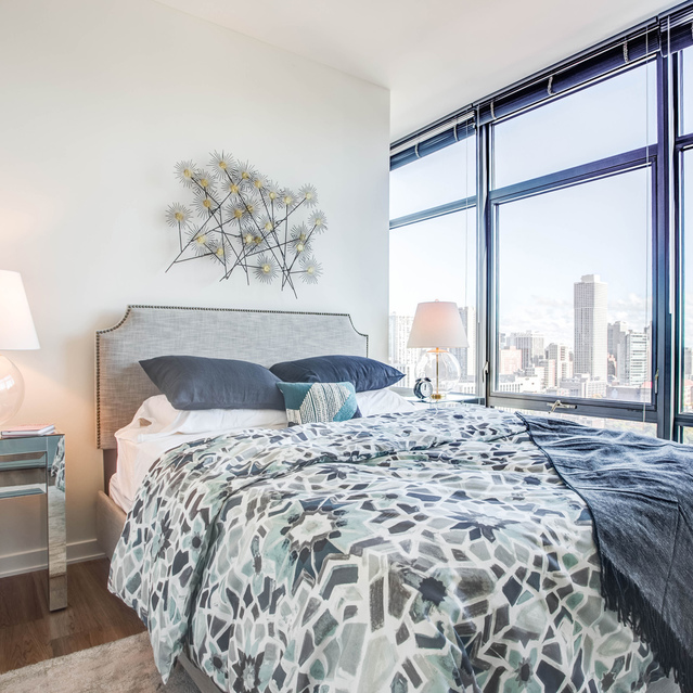 Next Apartments - Bedroom with City View